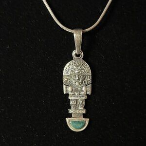 Vintage Peruvian Sterling Silver and Turquoise Pendant of Tumi Figure